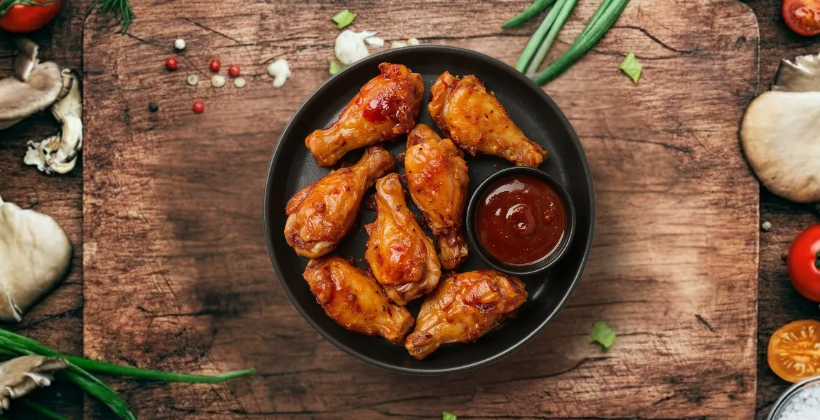 What Are the Secrets to Perfectly Sauced Wings Like Sixty5 Street's?